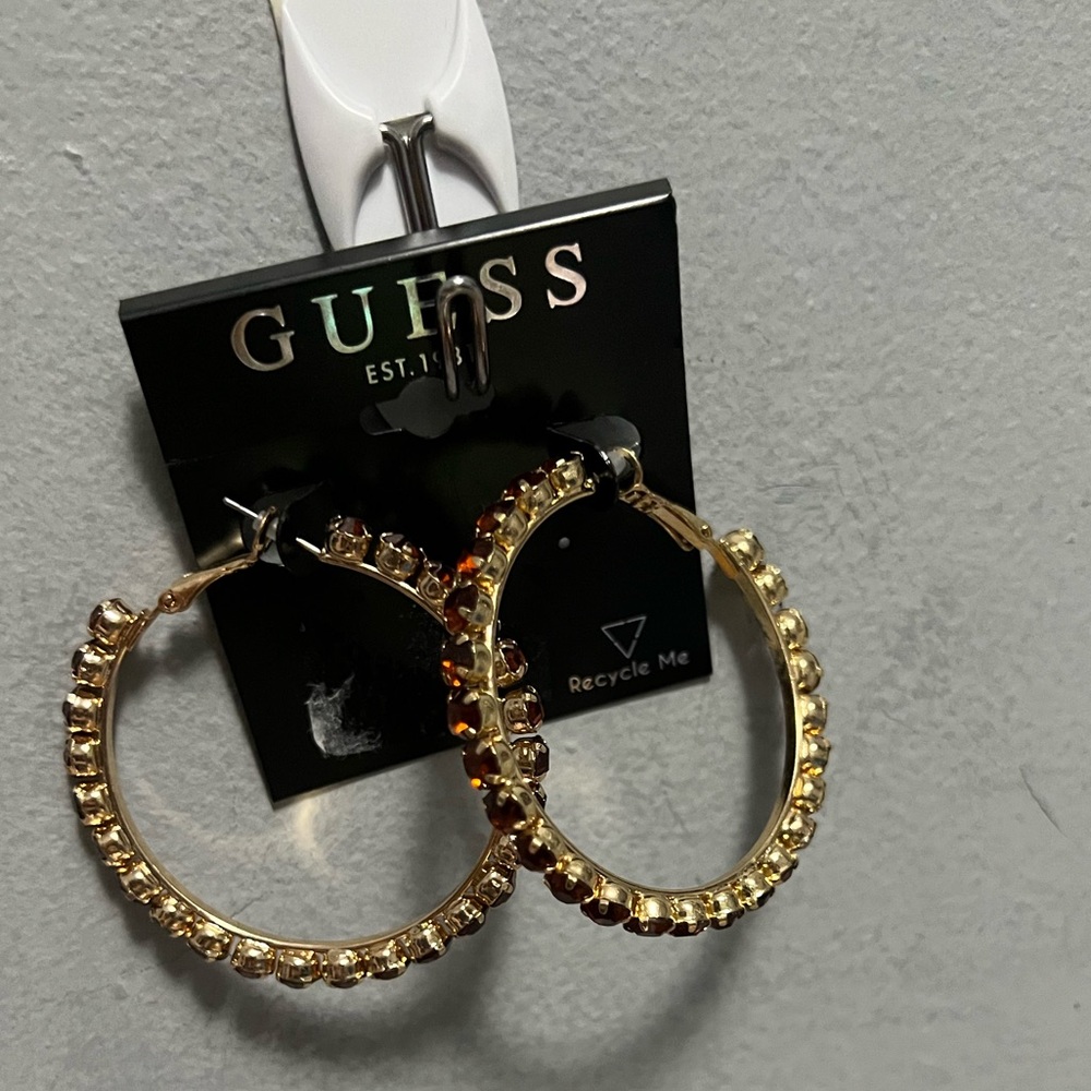 Guess gold tone Siam stone large hoop earrings